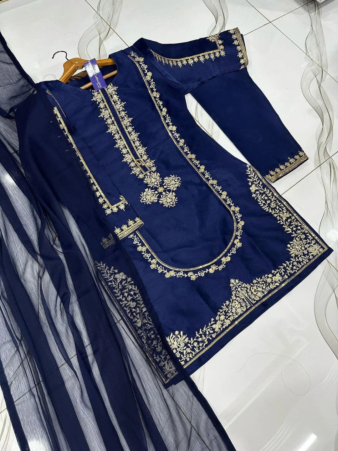 3 Pcs Women's Stitched Shamoz Silk Embroidered Suit...?